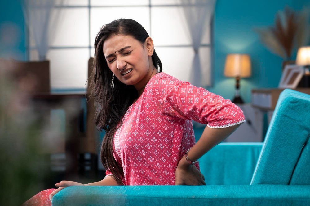 What causes back pain in females – 10 common causes